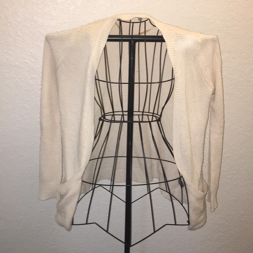 A cream cardigan